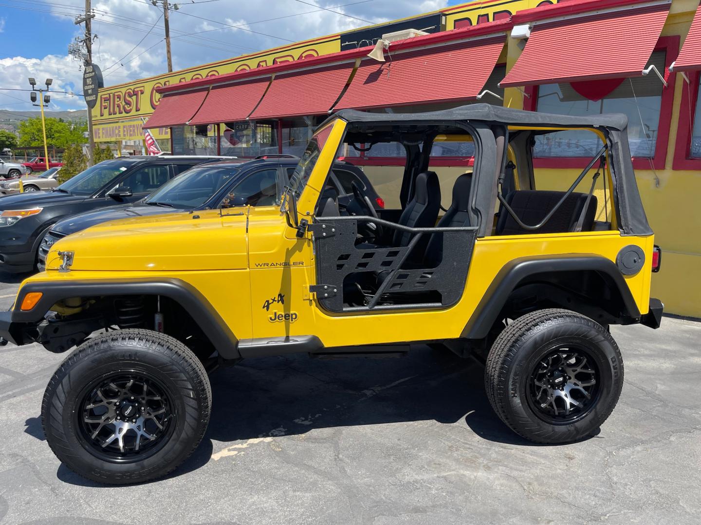 2000 Solar Yellow /Black Jeep Wrangler SE (1J4FA29P9YP) with an 2.5L 4 Cyl. engine, Manual transmission, located at 801 South State Street, Salt Lake City, UT, 84111, (801) 328-0098, 40.751953, -111.888206 - Wow extremely rare to find extra clean Jeep in immaculate condition 4x4! Low miles only 98,248 miles! Interior and exterior are both in excellent shape for the year. This is a clean title no reported accidents on the CarFax history report. It has passed emissions already and is ready to go. Featur - Photo#1